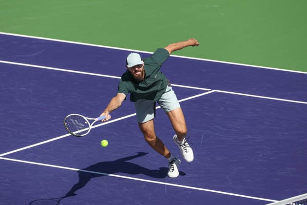 INDIAN WELLS, CA - MARCH 04: Reilly Opelka (USA) reaches for a forehand during the BNP Paribas Open on March 4, 2026 at Indian Wells Tennis Garden in Indian Wells, CA. (Photo by George Walker Icon Sportswire) TENNIS: MAR 04 BNP Paribas Open EDITORIAL USE ONLY Icon260304048