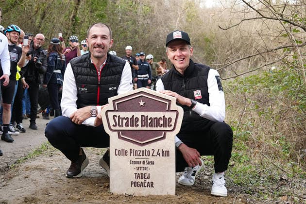Tadej Pogacar e Fabian Cancellara alla cerimonia di dedica del tratto di Colle Pinzuto a Tadej Pogacar, celebre salita sterrata nota per essere uno dei settori chiave della gara cicliastica Strade Bianche, a Siena (Italia) 5 marzo 2026 - ciclismo. (Foto Massimo Paolone LaPresse) The ceremony to dedicate the Colle Pinzuto section to Tadej Pogacar, a famous dirt road climb known for being one of the key sections of the Strade Bianche cycling race, in Siena (Italy) on March 5, 2026 - sports, cycling.  Copyright: xMassimoxPaolone LaPressex