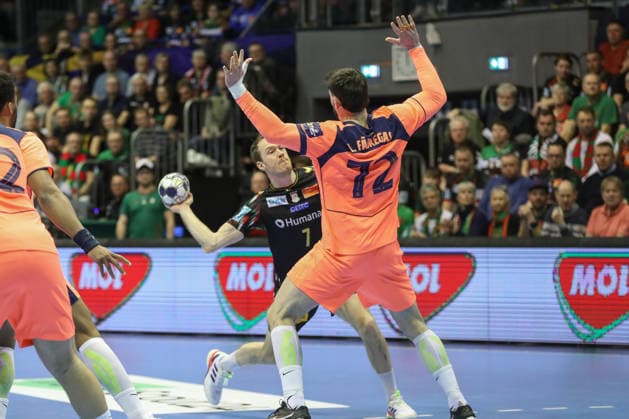 05.03.2026, xgox, Handball - EHF Champions League SC Magdeburg - FC Barcelona, Barca v.l. Felix Claar (Magdeburg, 7), Ludovic Fabregas (Barcelona, 72) Zweikampf, Duell, Kampf, tackle Magdeburg