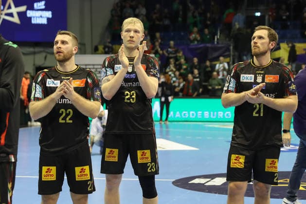 05.03.2026, xgox, Handball - EHF Champions League SC Magdeburg - FC Barcelona, Barca v.l. Magnus Saugstrup (Magdeburg, 23), Lukas Mertens (Magdeburg, 22), Albin Lagergren (Magdeburg, 21) enttaeuscht, schaut enttaeuscht, niedergeschlagen, disappointed Magdeburg