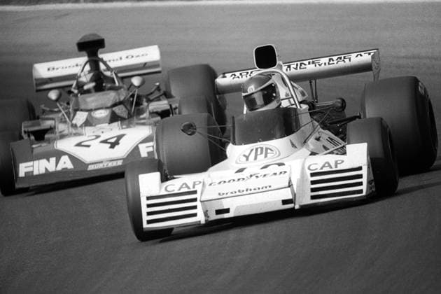Fourth placed Carlos Reutemann (ARG) Brabham BT42 leads Carlos Pace (BRA) Surtees TS14A, who finished in third position..Austrian Grand Prix, Rd 12, Osterreichring, Austria, 19 August 1973. Copyright: xSuttonxMotorsportsx