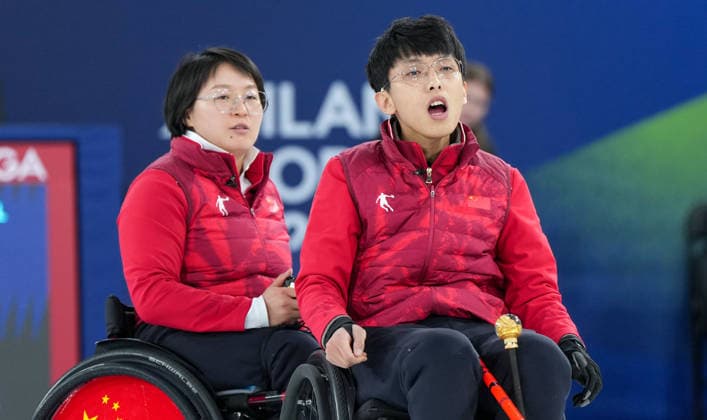 (260306) -- CORTINA D AMPEZZO, March 6, 2026 -- Wang Meng (L) Yang Jinqiao of China react during the wheelchair curling mixed doubles round robin session 4 match between China and South Korea at the Milan-Cortina 2026 Paralympic Winter games, Winterspiele,Spiele, Summer games in Cortina D ampezzo, Italy, March 6, 2026. ) (SP)ITALY-CORTINA D AMPEZZO-PARALYMPIC WINTER GAMES-WHEELCHAIR CURLING-MIXED DOUBLES WangxKaiyan 