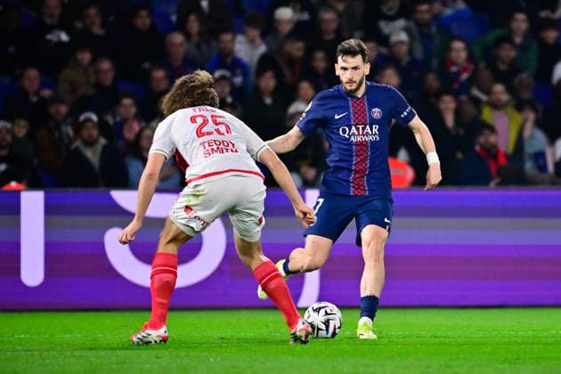 FOOTBALL : PSG vs Monaco - Ligue 1 - 06 03 2026 Wout Faes of Monaco and Khvicha Kvaratskhelia of Paris Saint Germain during the Ligue 1 match between Paris Saint Germain and AS Monaco at Parc des Princes on March 06, 2026 in Paris, France. ( Photo by Federico Pestellini PsnewZ ) - ParisFrance  Copyright: xFedericoxPestelinix