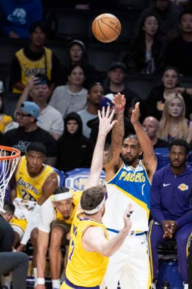 March 6, 2026, Los Angeles, California, USA: Indiana PacersÃ¢â‚¬â ¢ Obi Toppin (1) shoots against Los Angeles LakersÃ¢â‚¬â ¢ Luka DonÄÂiÄ¡ (77) during an NBA, Basketball Herren, USA basketball game at Crypto.com Arena on Friday, March 6, 2026 in Los Angeles. NBA 2026: Pacers Vs Lakers  - ZUMAc68_ 20260306_zaf_c68_013 Copyright: xRingoxChiux