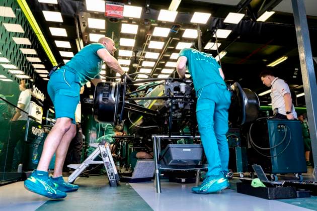 MELBOURNE - Mechanics work on the car of Formula 1 driver Lance Stroll of the Aston Martin Aramco Formula 1 Team during the Formula 1 Melbourne free practice and qualifying session at Albert Park on March 7, 2025 in Melbourne, Australia. (Photo by DeFodi Images) -