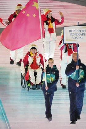 (260307) -- VERONA, March 7, 2026 -- Members of the delegation of China parade during the opening ceremony of Milan-Cortina 2026 Paralympic Winter games, Winterspiele,Spiele, Summer games at Verona Olympic Arena in Verona, Italy, March 6, 2026. ) (SP)ITALY-VERONA-PARALYMPIC WINTER GAMES-OPENING CEREMONY CaixYang 