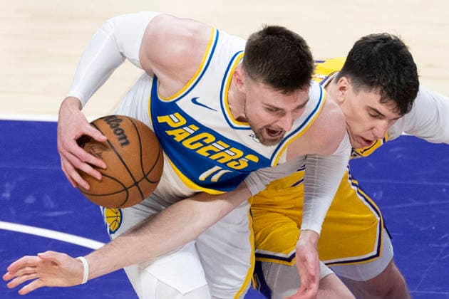 March 6, 2026, Los Angeles, California, USA: Indiana PacersÃ¢â‚¬â ¢ Micah Potter (11) and Los Angeles LakersÃ¢â‚¬â ¢ Jake LaRavia (12) vie for the ball during an NBA, Basketball Herren, USA basketball game at Crypto.com Arena on Friday, March 6, 2026 in Los Angeles. NBA 2026: Pacers Vs Lakers  - ZUMAc68_ 20260306_zaf_c68_041 Copyright: xRingoxChiux