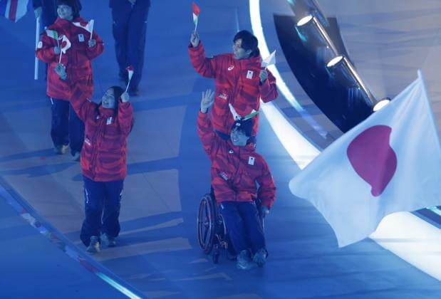 Milan Cortina Paralympics: Opening ceremony Japan s delegation, represented by para Ice hockey, Eishockey players Shunsuke Nakamura (R, front) and Akari Fukunishi (L, front), marches during the opening ceremony of the Milan Cortina Paralympics at the Verona Arena, a Roman amphitheater in Verona, Italy, on March 6, 2026.  A14AA0005355732P