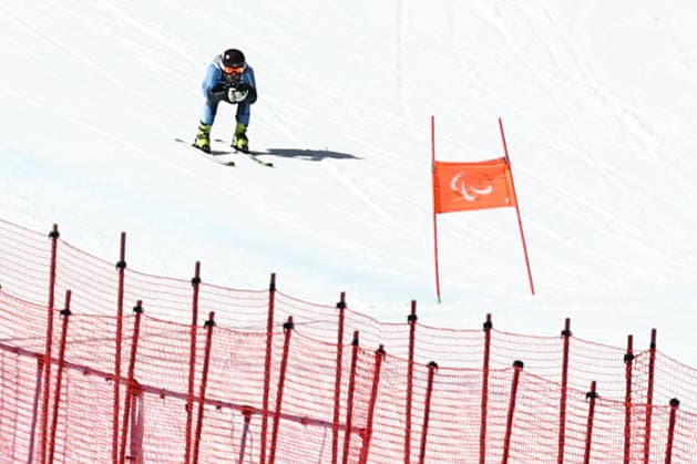 ITALY, VENETO - MARCH 7, 2026: Alexei Bugayev of Russia competes in the men s downhill skiing event during the 2026 Winter Paralympic Games on the Olympia delle Tofane of the Tofane Alpine Skiing Centre in Cortina d Ampezzo, Province of Belluno. Mikhail Tereshchenko TASS  89691216