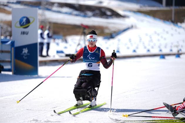 (260307) -- TESERO, March 7, 2026 -- Shan Yilin of China reacts after the women s sprint sitting final of para biathon at the Milan-Cortina 2026 Paralympic Winter games, Winterspiele,Spiele, Summer games in Tesero, Italy, March 7, 2026. ) (SP)ITALY-TESERO-PARALYMPIC WINTER GAMES-PARA BIATHLON-WOMEN S SPRINT SITTING HouxZhaokang 