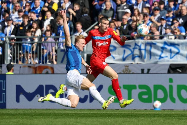 2026.03.07 xjfx 2.Bundesliga SV Darmstadt 98 - Holstein Kiel v.l., Isac Alexi Sivert Lidberg (SV Darmstadt 98), David Zec (Holstein Kiel) Zweikampf, Action, Aktion, Battles for the Ball (DFL DFB REGULATIONS PROHIBIT ANY USE OF PHOTOGRAPHS as IMAGE SEQUENCES and or QUASI-VIDEO)