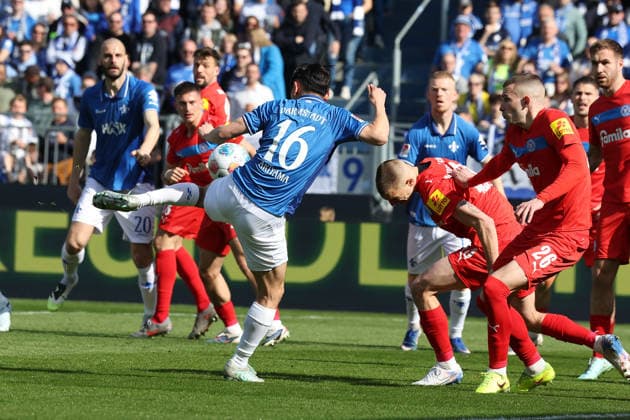 2026.03.07 xjfx 2.Bundesliga SV Darmstadt 98 - Holstein Kiel v.l., Hiroki Akiyama (SV Darmstadt 98), Ivan Nekic (Holstein Kiel) Zweikampf, Action, Aktion, Battles for the Ball (DFL DFB REGULATIONS PROHIBIT ANY USE OF PHOTOGRAPHS as IMAGE SEQUENCES and or QUASI-VIDEO)