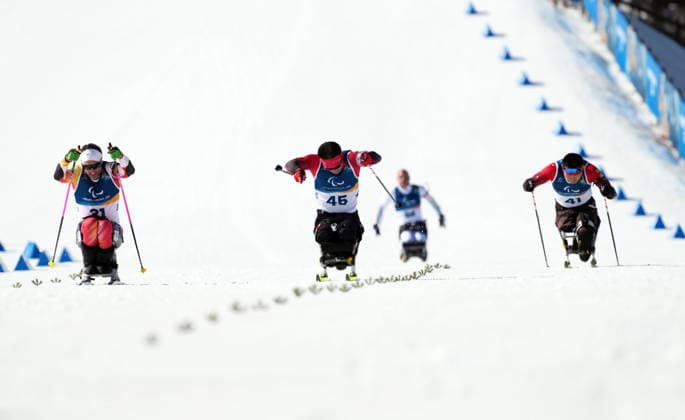 (260307) -- TESERO, March 7, 2026 -- Liu Mengtao (C) of China competes during the men s sprint sitting final of para biathon at the Milan-Cortina 2026 Paralympic Winter games, Winterspiele,Spiele, Summer games in Tesero, Italy, March 7, 2026. ) (SP)ITALY-TESERO-PARALYMPIC WINTER GAMES-PARA BIATHLON-MEN S SPRINT SITTING HouxZhaokang 