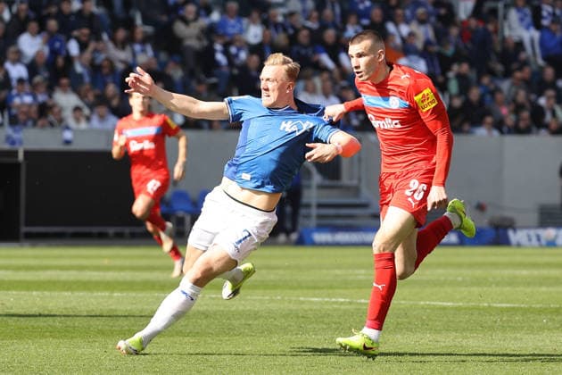 07.03.2026, xtvx, Fussball 2.Bundesliga, SV Darmstadt 98 - Holstein Kiel v.l. Zweikampf, Duell, duel, tackle, compete Isac Lidberg (SV Darmstadt 98) David Zec (Holstein Kiel) (DFL DFB REGULATIONS PROHIBIT ANY USE OF PHOTOGRAPHS as IMAGE SEQUENCES and or QUASI-VIDEO) Darmstadt