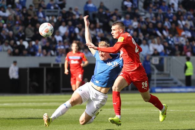 07.03.2026, xtvx, Fussball 2.Bundesliga, SV Darmstadt 98 - Holstein Kiel v.l. Zweikampf, Duell, duel, tackle, compete Isac Lidberg (SV Darmstadt 98) David Zec (Holstein Kiel) (DFL DFB REGULATIONS PROHIBIT ANY USE OF PHOTOGRAPHS as IMAGE SEQUENCES and or QUASI-VIDEO) Darmstadt