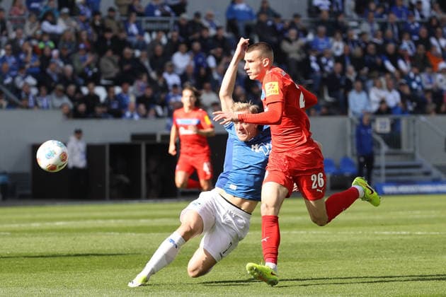 07.03.2026, xtvx, Fussball 2.Bundesliga, SV Darmstadt 98 - Holstein Kiel v.l. Zweikampf, Duell, duel, tackle, compete Isac Lidberg (SV Darmstadt 98) David Zec (Holstein Kiel) (DFL DFB REGULATIONS PROHIBIT ANY USE OF PHOTOGRAPHS as IMAGE SEQUENCES and or QUASI-VIDEO) Darmstadt