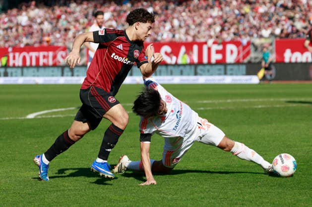 v.l.n.r.: Marko Soldic (1. FC Nürnberg) und Satoshi Tanaka (Fortuna Düsseldorf). Fussball 2. Bundesliga, 1. FC Nürnberg – Fortuna Düsseldorf im Max-Morlock-Stadion, Nürnberg, Deutschland, am 7. März 2026. in action during the 2. Bundesliga match between 1. FC Nürnberg and Fortuna Düsseldorf at the Max-Morlock-Stadion, Nuremberg, Germany, on March 7, 2026 DFL REGULATIONS PROHIBIT ANY USE OF PHOTOGRAPHS AS IMAGE SEQUENCES AND OR QUASI-VIDEO.