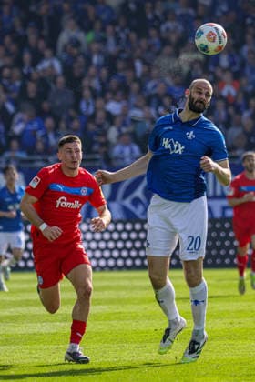 07.03.2026, xhettx, Fussball 2.Bundesliga, SV Darmstadt 98 - Holstein Kiel v.l. Aleksandar Vukotic (SV Darmstadt 98, 20) per Kopf zum Torwart (DFL DFB REGULATIONS PROHIBIT ANY USE OF PHOTOGRAPHS as IMAGE SEQUENCES and or QUASI-VIDEO)
