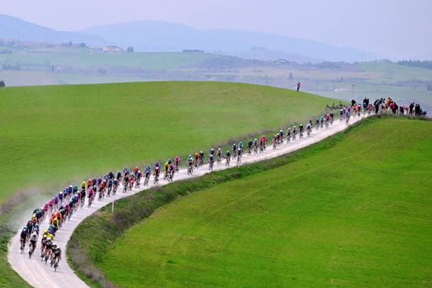 The pack of riders pictured in action during the men elite Strade Bianche one day cycling race, 203km from and to Siena, Italy on Saturday 07 March 2026. DIRKxWAEM  x166735995x