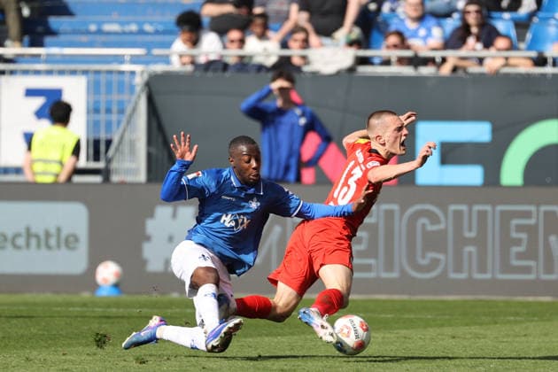 07.03.2026, xtvx, Fussball 2.Bundesliga, SV Darmstadt 98 - Holstein Kiel v.l. Zweikampf, Duell, duel, tackle, compete Merveille Papela (SV Darmstadt 98) Ivan Nekic (Holstein Kiel) (DFL DFB REGULATIONS PROHIBIT ANY USE OF PHOTOGRAPHS as IMAGE SEQUENCES and or QUASI-VIDEO) Darmstadt