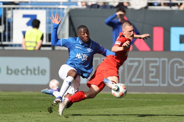 07.03.2026, xtvx, Fussball 2.Bundesliga, SV Darmstadt 98 - Holstein Kiel v.l. Zweikampf, Duell, duel, tackle, compete Merveille Papela (SV Darmstadt 98) Ivan Nekic (Holstein Kiel) (DFL DFB REGULATIONS PROHIBIT ANY USE OF PHOTOGRAPHS as IMAGE SEQUENCES and or QUASI-VIDEO) Darmstadt
