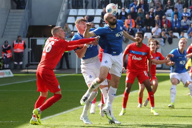 07.03.2026, xtvx, Fussball 2.Bundesliga, SV Darmstadt 98 - Holstein Kiel v.l. Zweikampf, Duell, duel, tackle, compete David Zec (Holstein Kiel) Aleksandar Vukotic (SV Darmstadt 98) (DFL DFB REGULATIONS PROHIBIT ANY USE OF PHOTOGRAPHS as IMAGE SEQUENCES and or QUASI-VIDEO) Darmstadt