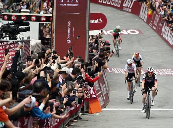 Swiss Elise Chabbey of FDJ Suez celebrates as she crosses the finish line to win the women elite Strade Bianche one day cycling race, 133km from and to Siena, Italy, on Saturday 07 March 2026. ELIASxROM  x166737752x
