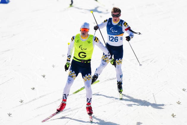 260307 Zebastian Modin of Sweden with guide Emil Talsi competes in men s sprint vision impaired biathlon on March 7, 2026 in Val di Fiemme. Photo: Oscar Olsson Swedish Parasport Federation BILDBYRAN kod XY XY0100 skidskytte biathlon skiskyting 2026 paralympics day 1 para biathlon mens sprint sitting bbeng paralympic games paralympics paralympiska spel paralympiske leker vinter-paralympics winter paralympics milano cortina 2026 milano cortina 2026 winter paralympic games paraskidskytte *** 260307 Zebastian Modin of Sweden with guide Emil Talsi competes in men s sprint vision impaired biathlon on March 7, 2026 in Val di Fiemme Photo Oscar Olsson Swedish Parasport Federation BILDBYRAN code XY XY0100 biathlon biathlon biathlon 2026 paralympics day 1 para biathlon mens sprint sitting bbeng paralympic games paralympiska spel paralympiske leker vinter paralympics winter paralympics milano cortina 2026 milano cortina 2026 winter paralympic games paraskidskytte  Copyright: OscarxOlsson BB260307ZT025