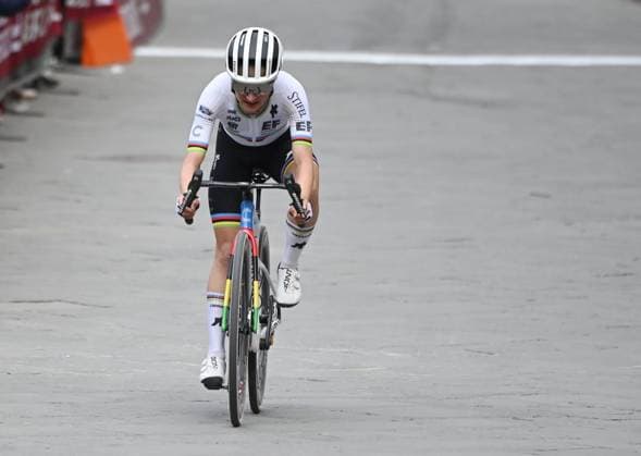 Italian Elisa Longo Borghini of UAE Team ADQ crosses the finish line at the women elite Strade Bianche one day cycling race, 133km from and to Siena, Italy, on Saturday 07 March 2026. ELIASxROM  x166739270x