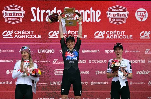 Polish Katarzyna Niewiadoma-Phinney of CANYON SRAM Zondacrypto, Swiss Elise Chabbey of FDJ celebrate onSUEZ and German Franziska Koch of FDJ United SUEZ celebrate on the podium of the women elite Strade Bianche one day cycling race, 133km from and to Siena, Italy, on Saturday 07 March 2026. ELIASxROM  x166740647x