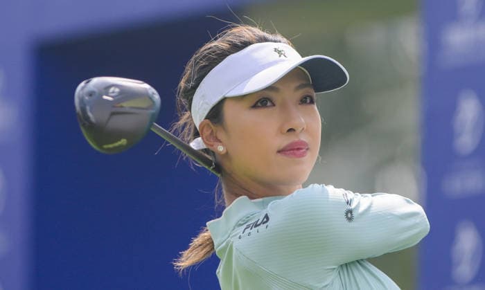 (260307) -- LINGSHUI, March 7, 2026 -- He Muni of China plays a shot during the third round of the Blue Bay LPGA, Golf Damen golf tournament in Lingshui, south China s Hainan Province, March 7, 2026. ) (SP)CHINA-HAINAN-LINGSHUI-GOLF-BLUE BAY LPGA (CN) YangxGuanyu 