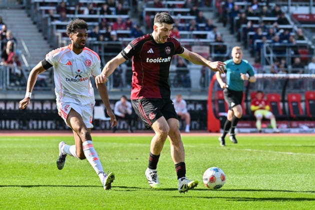 2. Bundesliga; 1. FC Nuremberg- Fortuna Düsseldorf; 07.03.2026 NUREMBERG, GERMANY - 07. MARCH: im Duell Elias EGOULI (Fortuna Düsseldorf 44) und Luka LOCHOSHVILI (1. FC Nuernberg 24) während dem Match zwischen dem 1. FC Nürnberg und Fortuna Düsseldorf am 25. Spieltag der 2. Bundesliga im Max Morlock Stadion DFL REGULATIONS PROHIBIT ANY USE OF PHOTOGRAPHS AS IMAGE SEQUENCES AND OR QUASI-VIDEO