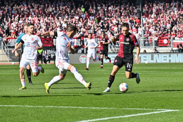 2. Bundesliga; 1. FC Nuremberg- Fortuna Düsseldorf; 07.03.2026 NUREMBERG, GERMANY - 07. MARCH: im Duell Tim OBERDORF (Fortuna Düsseldorf 15) und Julian JUSTVAN (1. FC Nuernberg 10) während dem Match zwischen dem 1. FC Nürnberg und Fortuna Düsseldorf am 25. Spieltag der 2. Bundesliga im Max Morlock Stadion