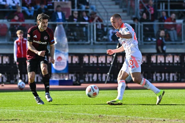 2. Bundesliga; 1. FC Nuremberg- Fortuna Düsseldorf; 07.03.2026 NUREMBERG, GERMANY - 07. MARCH: im Duell Tom BAACK (1. FC Nuernberg 5) und Marin LJUBICIC (Fortuna Düsseldorf 20) während dem Match zwischen dem 1. FC Nürnberg und Fortuna Düsseldorf am 25. Spieltag der 2. Bundesliga im Max Morlock Stadion DFL REGULATIONS PROHIBIT ANY USE OF PHOTOGRAPHS AS IMAGE SEQUENCES AND OR QUASI-VIDEO