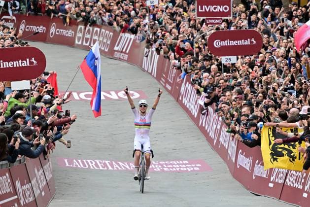 Slovenian Tadej Pogacar of UAE Team Emirates - XRG celebrates after winning the men elite Strade Bianche one day cycling race, 203km from and to Siena, Italy on Saturday 07 March 2026. DIRKxWAEM  x166755539x