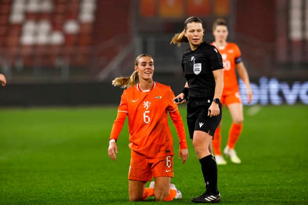 2026-03-07 Netherlands v Ireland - Women s world cup qualifier BERLIN, GERMANY - MARCH 7: Jill Roord of The Netherlands, Referee Frida Klarlund during the Women s world cup qualifier match between Netherlands and Ireland at Olympiastadium on March 7, 2026 in Berlin, Germany. Berlin Olympiastadium Germany Content not available for redistribution in The Netherlands directly or indirectly through any third parties. Copyright: xBenxGalx