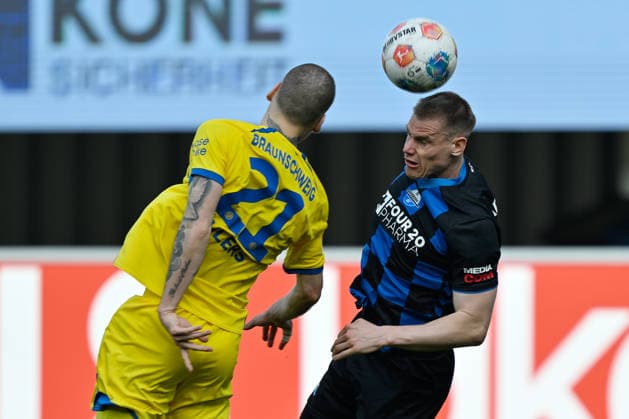 Paderborn, Home Deluxe Arena, 07.03.26, GER, Herren, 2.Bundesliga, Saison 2025-2026, SC Paderborn 07 - Eintracht Braunschweig Bild: v.li. im Zweikampf Kevin EHLERS (Braunschweig) und Steffen TIGGES (Paderborn) DFL regulations prohibit any use of photographs as image sequences and or quasi-video. NRW Deutschland