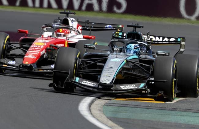 MELBOURNE - Charles Leclerc (Ferrari) and George Russell (Mercedes) during the race at Albert Park Circuit in the lead-up to the Australian Grand Prix. SANDER KONING ANP xVIxANPxSportx xxANPxIVx 552737674 originalFilename: 552737674.jpg