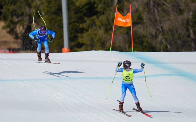 (260308) -- CORTINA D AMPEZZO, March 8, 2026 -- Giacomo Bertagnolli (L) of Italy competes with his guide Andrea Ravelli during the para alpine skiing men s downhill vision impaired match at the Milan-Cortina 2026 Paralympic Winter games, Winterspiele,Spiele, Summer games in Cortina D ampezzo, Italy, March 7, 2026. ) (SP)ITALY-CORTINA D AMPEZZO-PARALYMPIC WINTER GAMES-PARA ALPINE SKIING-MEN S DOWNHILL-VISION IMPAIRED WangxKaiyan 