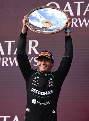 2026 AUSTRALIAN F1 GRAND PRIX, Mercedes driver George Russell celebrates on the podium after winning the 2026 Australian Grand Prix at Albert Park Circuit in Melbourne, Sunday, March 8, 2026. ( NO ARCHIVING, EDITORIAL USE ONLY MELBOURNE VICTORIA AUSTRALIA  Copyright: xJOELxCARRETTx 20260308142083409764