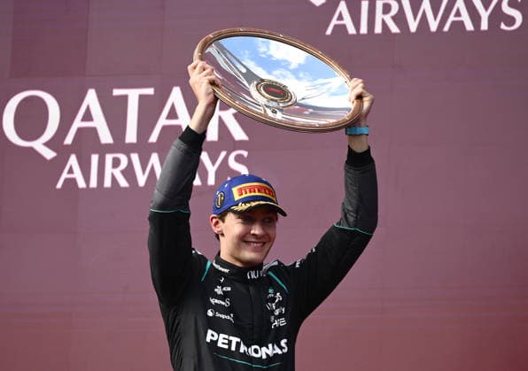 2026 AUSTRALIAN F1 GRAND PRIX, Mercedes driver George Russell celebrates on the podium after winning the 2026 Australian Grand Prix at Albert Park Circuit in Melbourne, Sunday, March 8, 2026. ( NO ARCHIVING, EDITORIAL USE ONLY MELBOURNE VICTORIA AUSTRALIA  Copyright: xJOELxCARRETTx 20260308183527675524