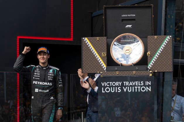 Podium Formula One Australian Grand Prix Melbourne EB RUSSELL George (gbr) with the Louis Vuitton Trophy case on the podium of the Formula One Australian Grand Prix at Albert Park in Melbourne on March 8, 2026. Photo by Eliot Blondet ABACAPRESS.COM Melbourne Australia Australia  Copyright: xBlondetxEliot ABACAx
