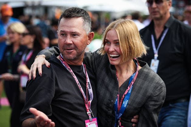 March 8, 2026, Melbourne, Victoria, Australia: MELBOURNE, AUSTRALIA - MARCH 08 2026: Lara Worthington and Ricky Ponting embrace before the main race at the 2026 Australian Grand Prix at Albert Park in Melbourne, Australia Melbourne Australia - ZUMAp121 20260308_zsp_p121_016 Copyright: xChrisxPutnamx