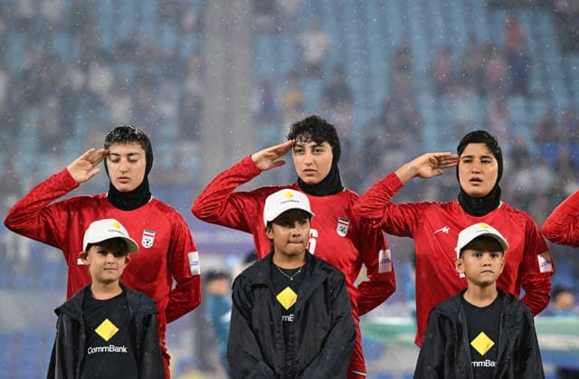 SOCCER ASIAN CUP IRAN PHILIPPINES, Iran players are seen during their national anthem during the national anthem during the AFC Women™s Asian Cup Group A match between Iran and Philippines at Gold Coast Stadium on the Gold Coast, Sunday, March 8, 2026. ( NO ARCHIVING, EDITORIAL USE ONLY GOLD COAST QUEENSLAND AUSTRALIA  Copyright: xDAVExHUNTx 20260308187531922751
