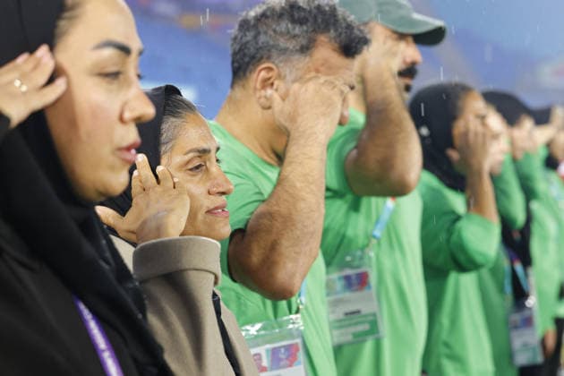 GOLD COAST, AUSTRALIA - MARCH 08 Marziyeh Jafari (IR Iran Head Coach - 2nd from left) is seen saluting the national anthem before the Womens Asian Cup match between Islamic Republic of Iran and Philippines at the Gold Coast Stadium on March 08 2026 in Gold Coast, Australia Copyright: xMatthewxStarlingx xSPPx Sportspressphoto_SPR104776