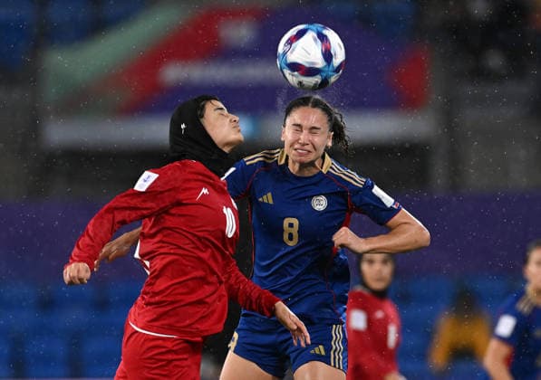 SOCCER ASIAN CUP IRAN PHILIPPINES, Fatemeh Pasandideh of Islamic Republic of Iran (L) competes with Sara Eggesvik of the Philippines during the AFC Women™s Asian Cup Group A match between Iran and Philippines at Gold Coast Stadium on the Gold Coast, Sunday, March 8, 2026. ( NO ARCHIVING, EDITORIAL USE ONLY GOLD COAST QUEENSLAND AUSTRALIA  Copyright: xDAVExHUNTx 20260308170909541666