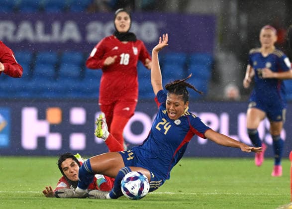 SOCCER ASIAN CUP IRAN PHILIPPINES, Mallie Ramirez of the Philippines is fouled by Zahra Sarbali of Islamic Republic of Iran during the AFC Women™s Asian Cup Group A match between Iran and Philippines at Gold Coast Stadium on the Gold Coast, Sunday, March 8, 2026. ( NO ARCHIVING, EDITORIAL USE ONLY GOLD COAST QUEENSLAND AUSTRALIA  Copyright: xDAVExHUNTx 20260308142681081630