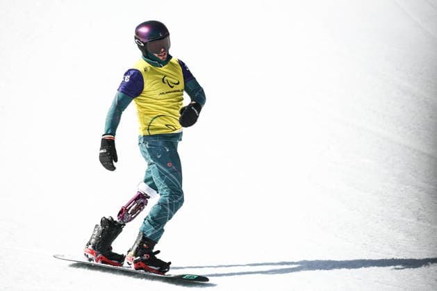 ITALY, VENETO - MARCH 8, 2026: Filipp Shebbo of Russia competes in the men s para snowboard snowboard cross SB-LL1 event during the 2026 Winter Paralympic Games on the Olympia delle Tofane of the Tofane Alpine Skiing Centre in Cortina d Ampezzo, Province of Belluno 2026 Winter Paralympics: Para Snowboard  - ZUMAt113 20260308_zaa_t113_084 Copyright: xMikhailxTereshchenkox