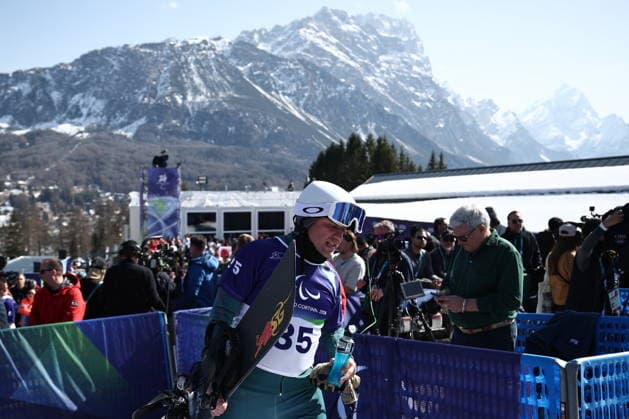 ITALY, VENETO - MARCH 8, 2026: Dmitry Fadeyev of Russia during the men s para snowboard snowboard cross SB-LL1 event during the 2026 Winter Paralympic Games on the Olympia delle Tofane of the Tofane Alpine Skiing Centre in Cortina d Ampezzo, Province of Belluno 2026 Winter Paralympics: Para Snowboard  - ZUMAt113 20260308_zaa_t113_086 Copyright: xMikhailxTereshchenkox