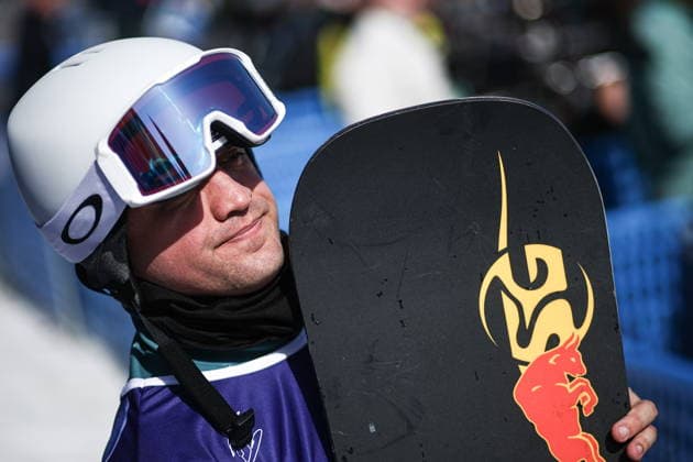 ITALY, VENETO - MARCH 8, 2026: Dmitry Fadeyev of Russia during the men s para snowboard snowboard cross SB-LL1 event at Cortina Para Snowboard Park during the 2026 Winter Paralympic Games. Mikhail Tereshchenko TASS  89753673